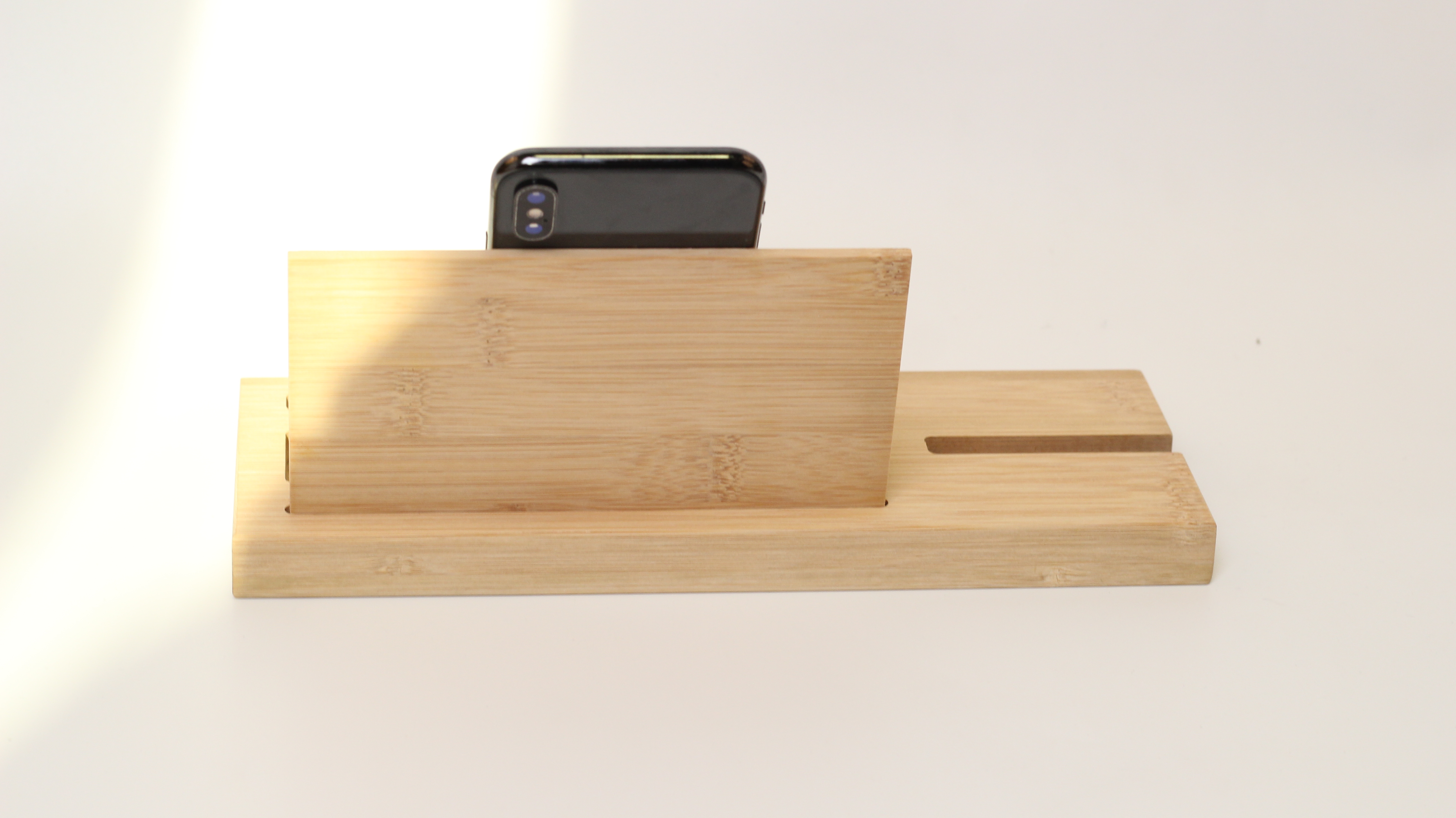 Bamboo desktop inductive mobile phone bracket